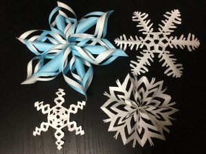 Origami and kirigami (cut-out) snowflakes