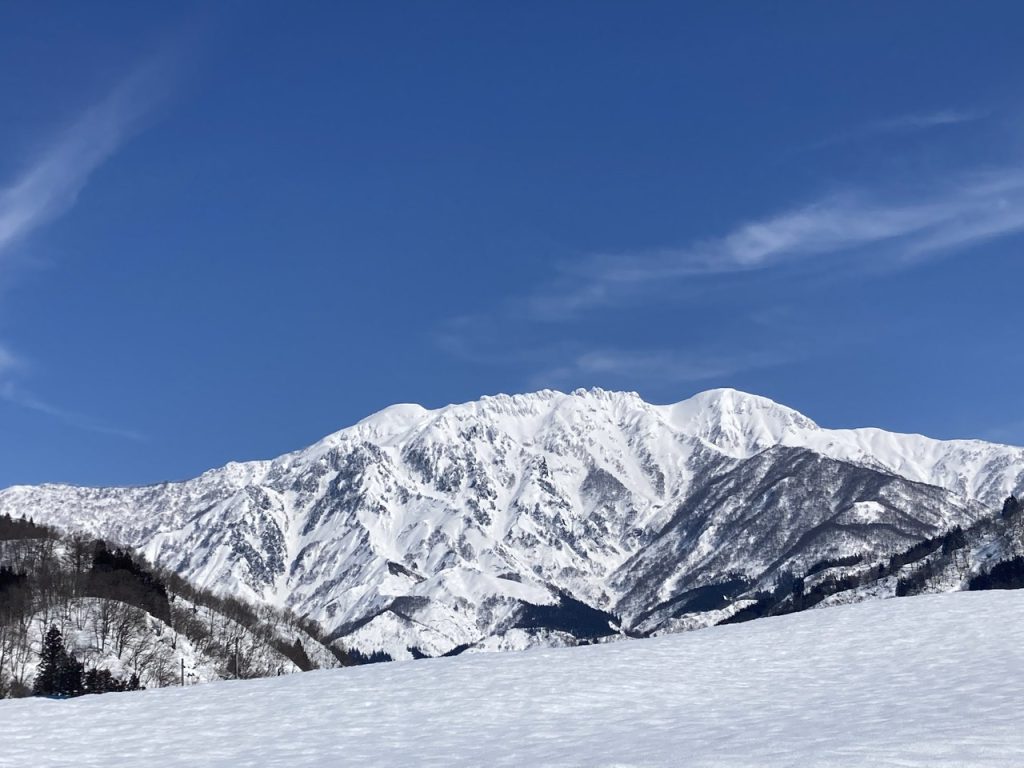 Mt. Hakkai (Hakkaisan 八海山) and the valley around it covered in snow in Minamiuonuma, Niigata, Japan